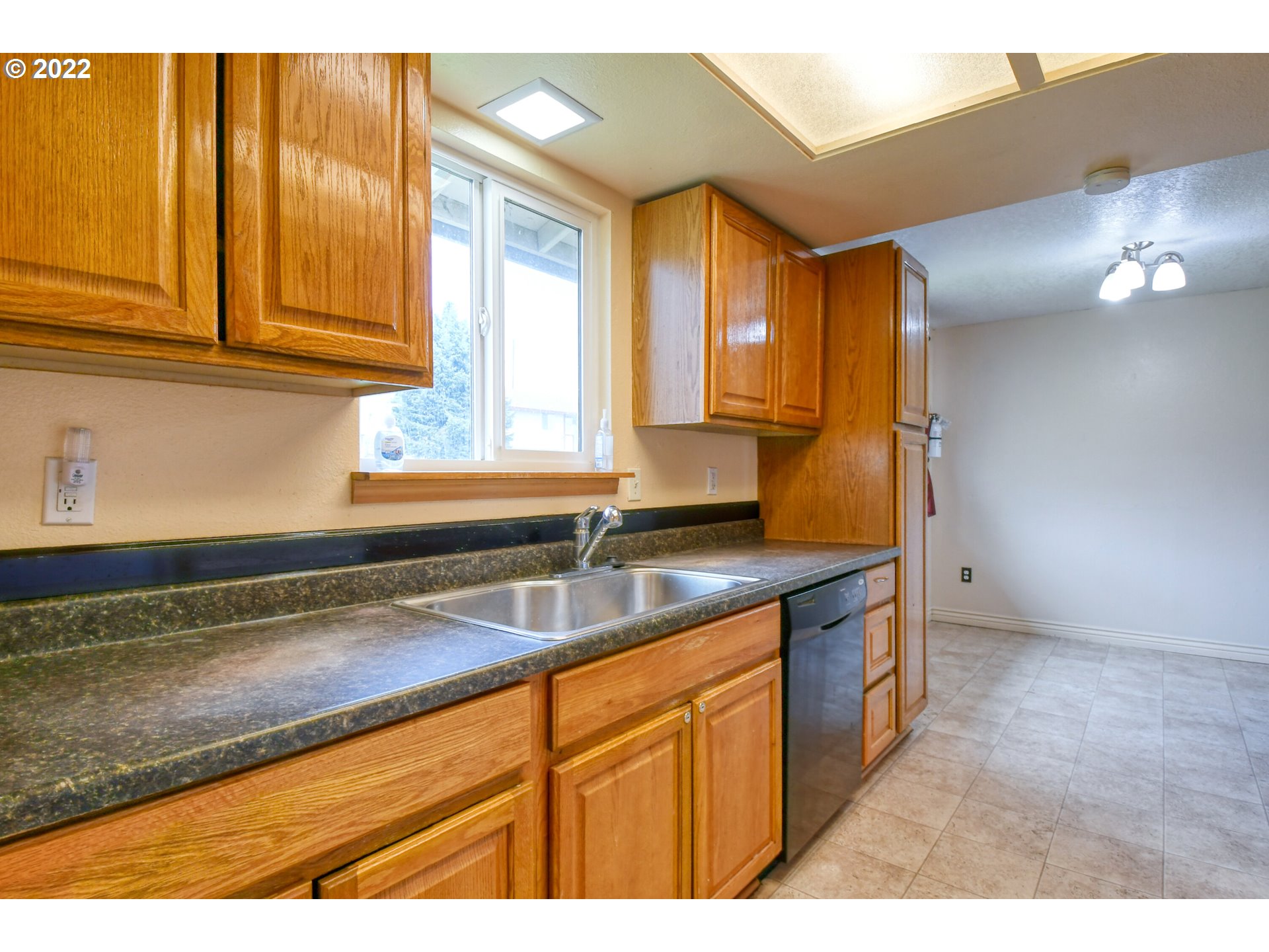 1816 Southwest 45th Street Pendleton, OR 97801 - Photo 9 of 32 a kitchen that has a sink and cabinets