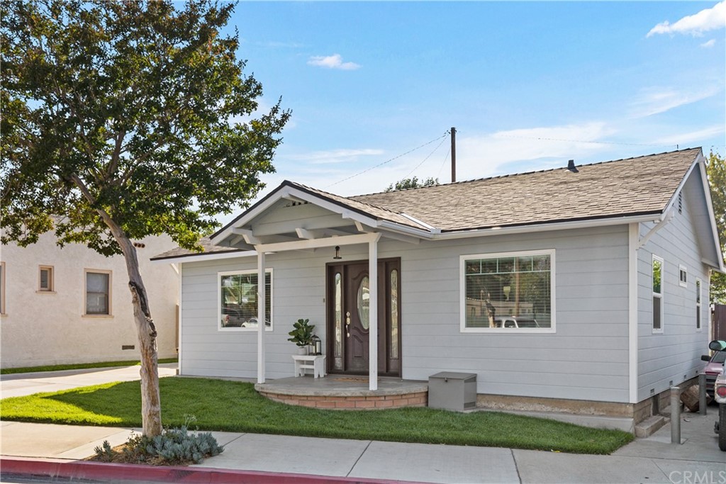 1943 Main Street Riverside, CA 92501 - Photo 1 of 1 a front view of a house with garden