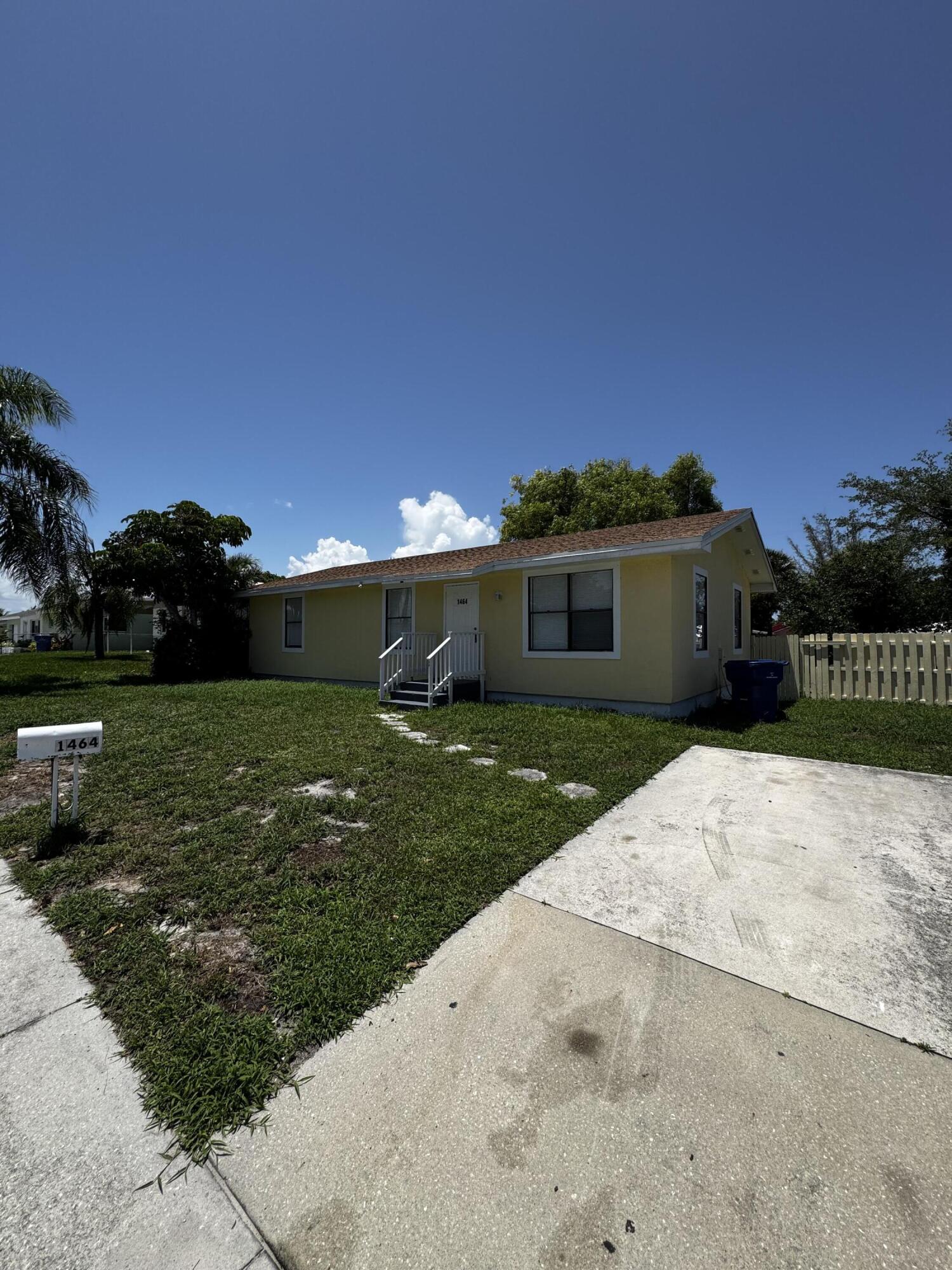 1464 West 32nd Street Riviera Beach, FL 33404 - Photo 1 of 28 front