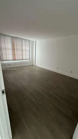 a bathroom with a sink and a window