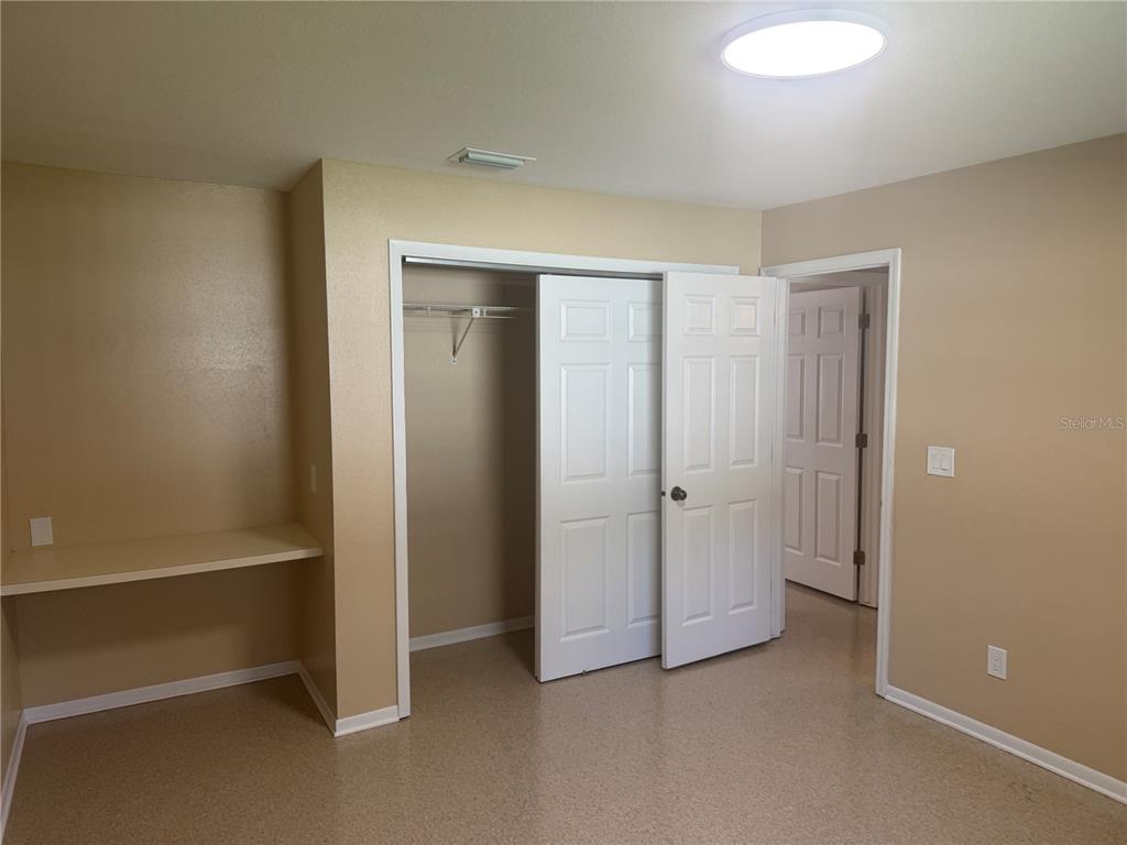 5222 Bogdonoff Drive, Unit A Seffner, FL 33584 - Photo 12 of 16 an empty room with closet