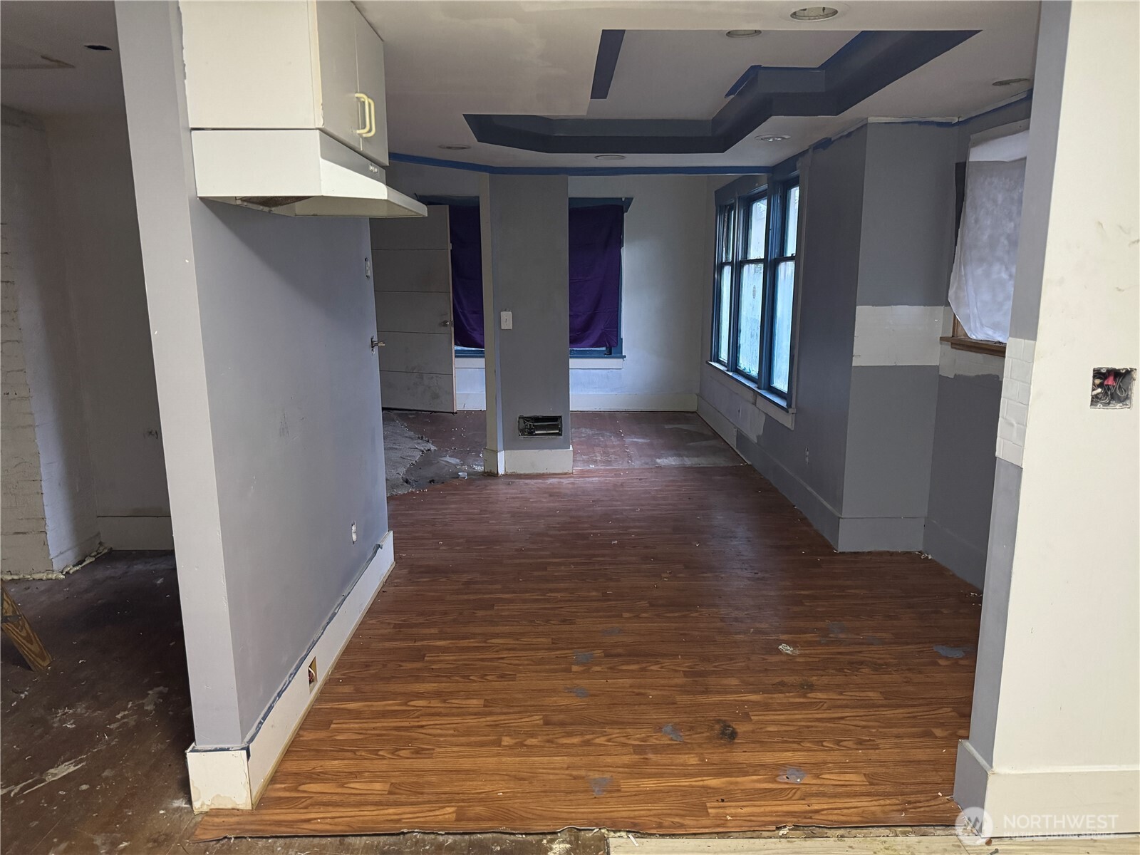 126 West 5th Street Port Angeles, WA 98362 - Photo 12 of 34 a view of a hallway with wooden floor and staircase