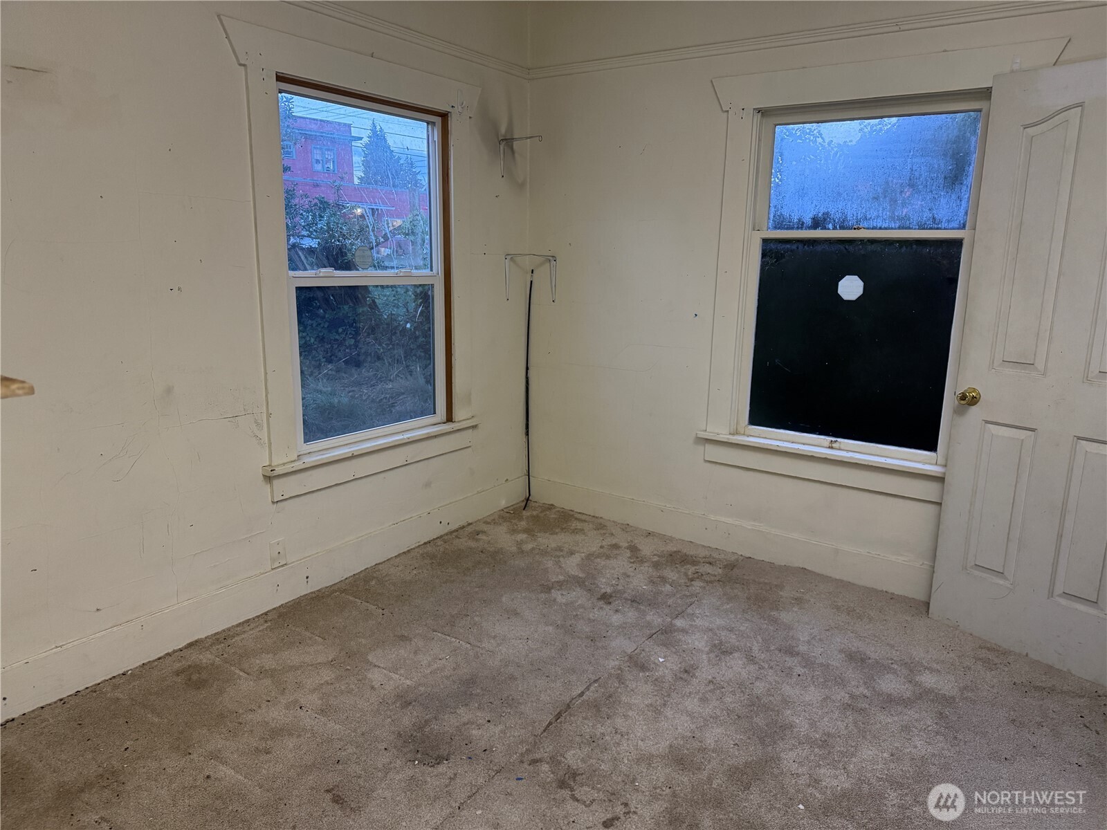 126 West 5th Street Port Angeles, WA 98362 - Photo 15 of 34 a view of an empty room with a window