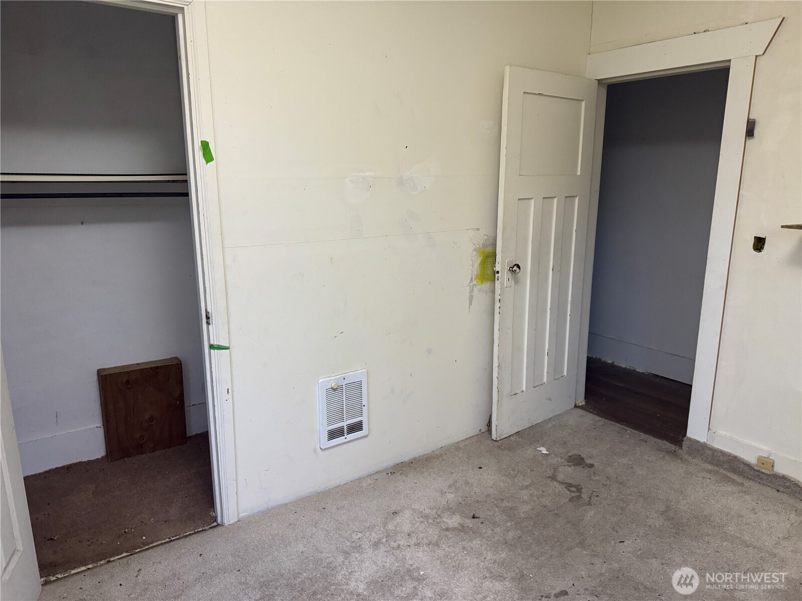 126 West 5th Street Port Angeles, WA 98362 - Photo 16 of 34 an empty room with windows