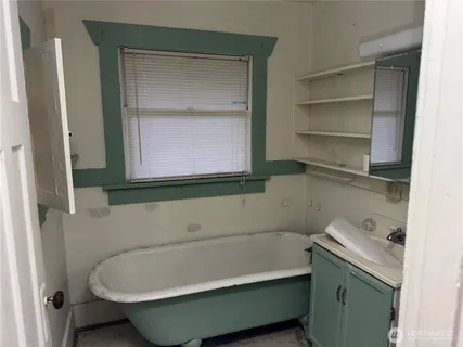 a bathroom with a sink and a bathtub