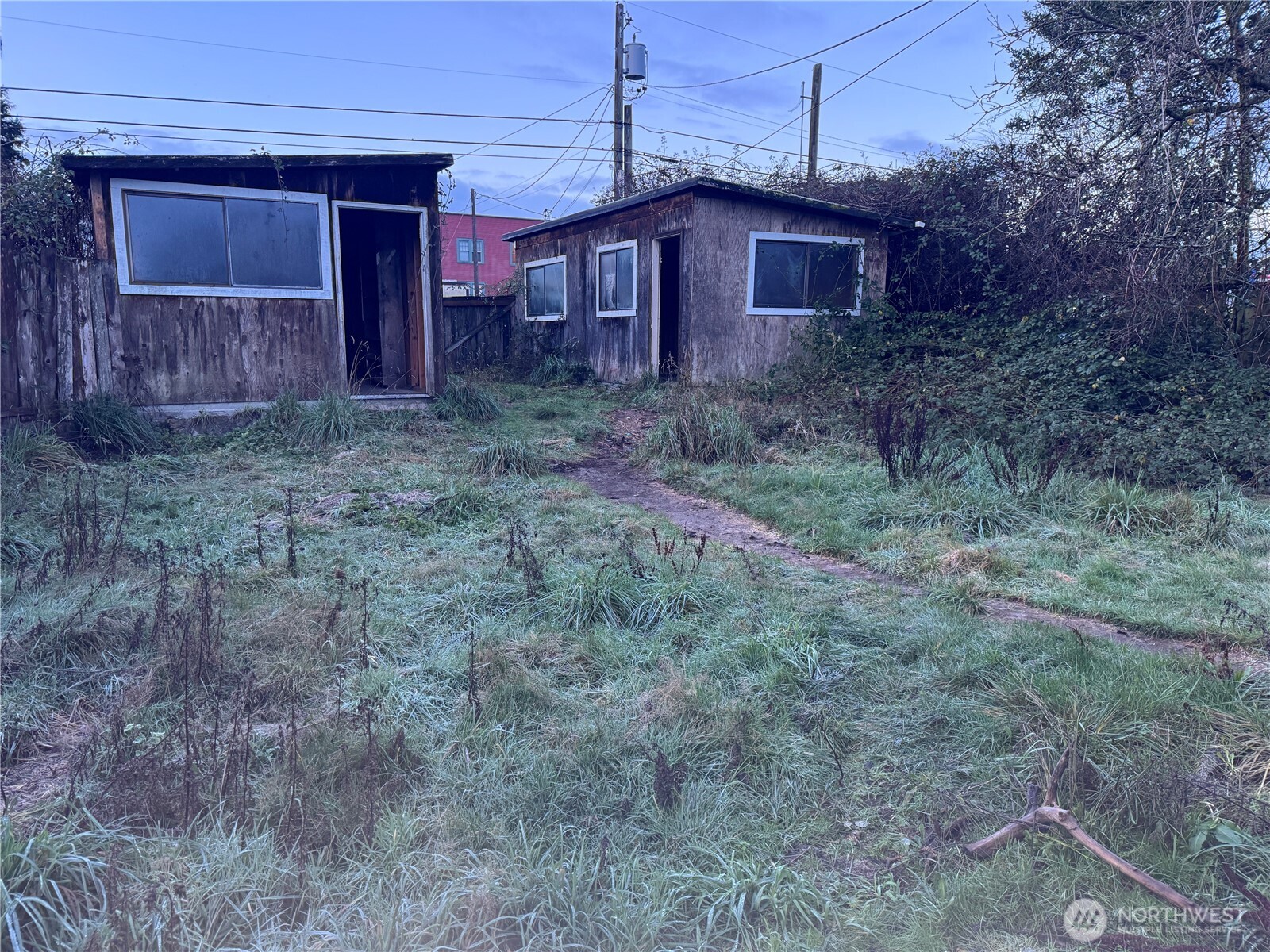 126 West 5th Street Port Angeles, WA 98362 - Photo 27 of 34 a view of a barn house in the middle of a yard