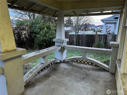 a view of a porch with a yard
