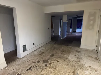 a view of a hallway with staircase