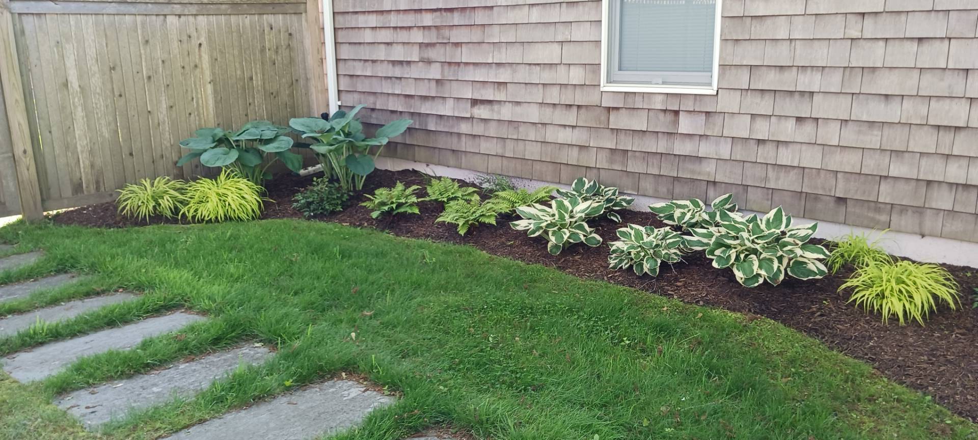 41 Sandra Road East Hampton, NY 11937 - Photo 15 of 16 a view of a backyard with a garden