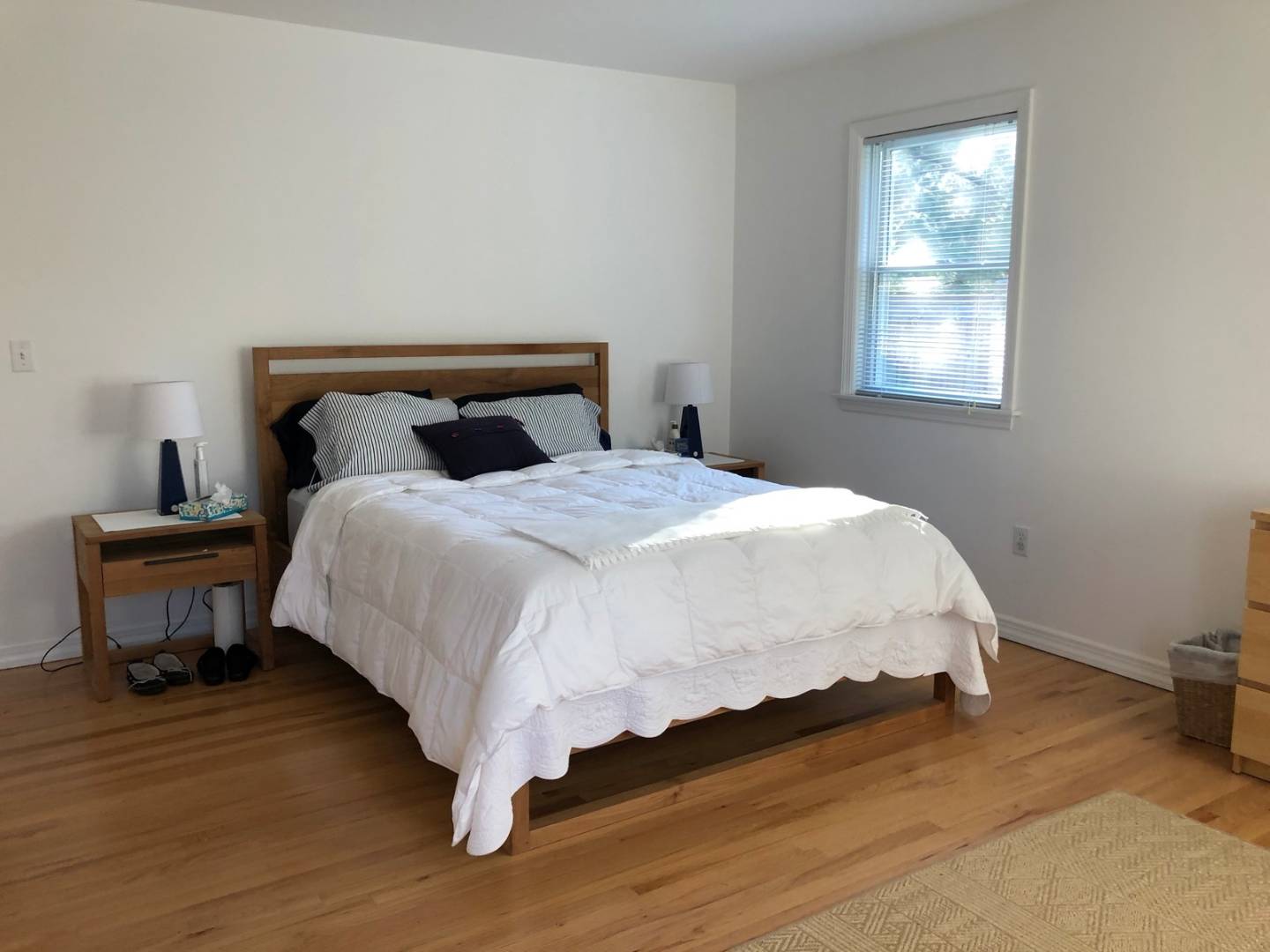 41 Sandra Road East Hampton, NY 11937 - Photo 9 of 16 a bedroom with a bed and wooden floor