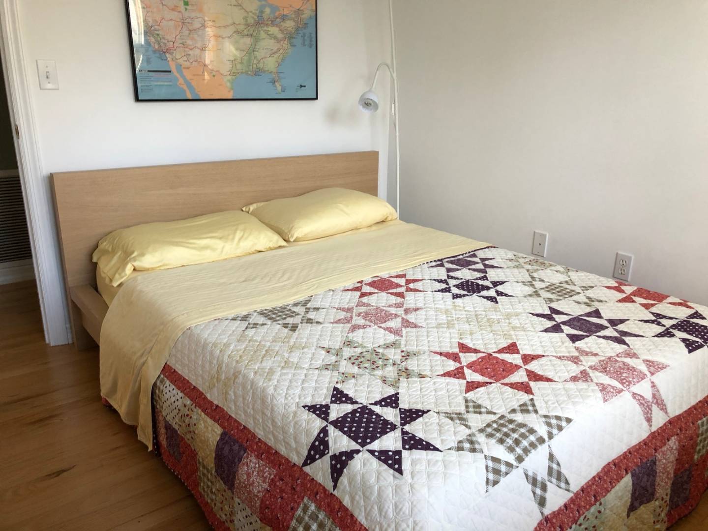 41 Sandra Road East Hampton, NY 11937 - Photo 10 of 16 a bedroom with a bed and a painting on the wall