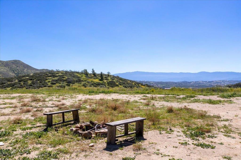40707 Intrepid Road Hemet, CA 92544 - Photo 32 of 71 a view of a lake with a mountain
