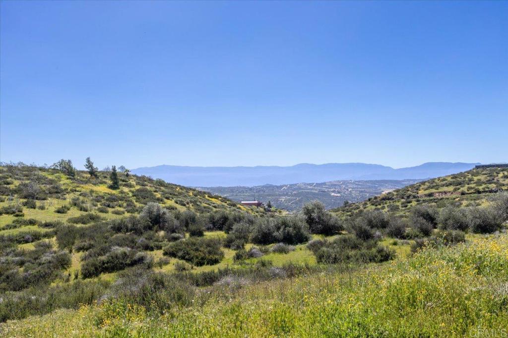 40707 Intrepid Road Hemet, CA 92544 - Photo 33 of 71 a view of a city with mountains in the background