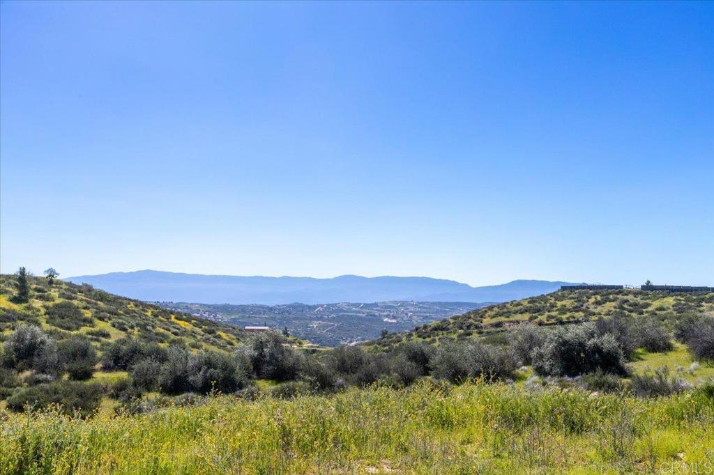 40707 Intrepid Road Hemet, CA 92544 - Photo 34 of 71 a view of a city with mountains in the background