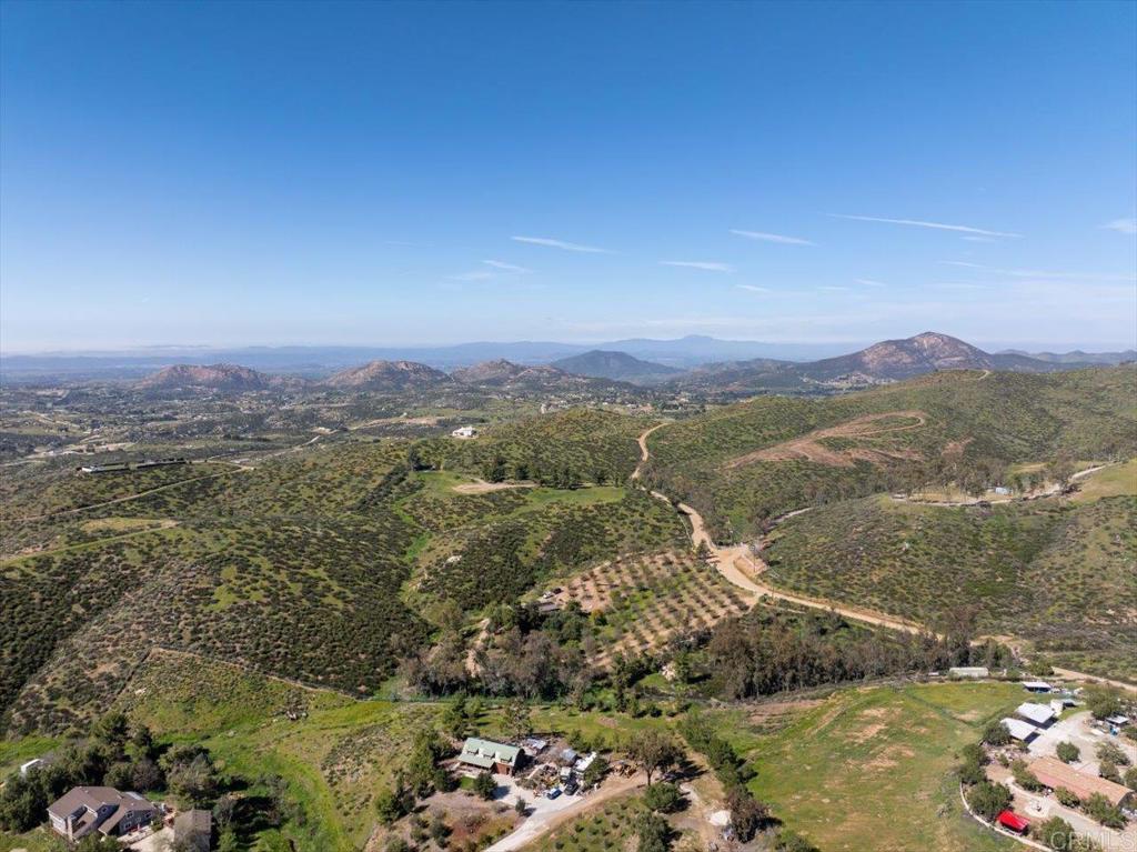 40707 Intrepid Road Hemet, CA 92544 - Photo 45 of 71 a view of a lake with mountains in the background