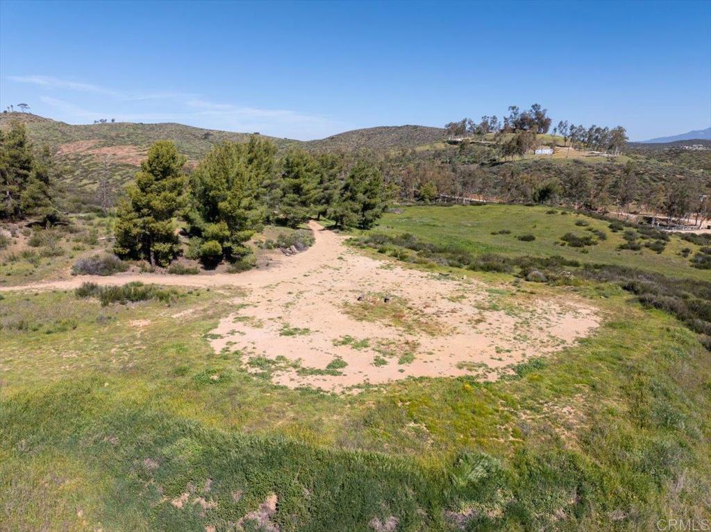 40707 Intrepid Road Hemet, CA 92544 - Photo 58 of 71 a view of a field with a mountain in the background