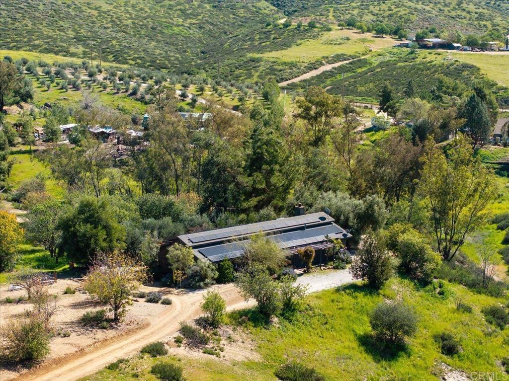 40707 Intrepid Road Hemet, CA 92544 - Photo 61 of 71 a view of a yard with wooden fence