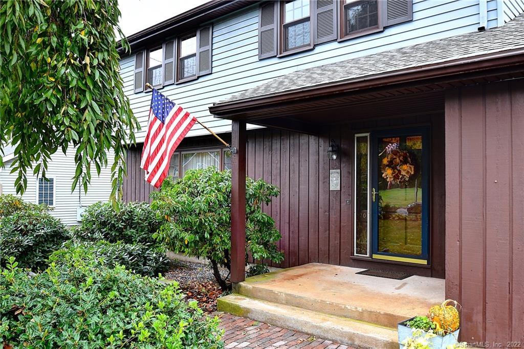 20 Midwell Road Wethersfield, CT 06109 - Photo 1 of 1 a front view of a house with garden