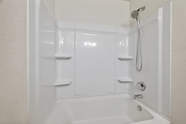 a bathroom with a bathtub