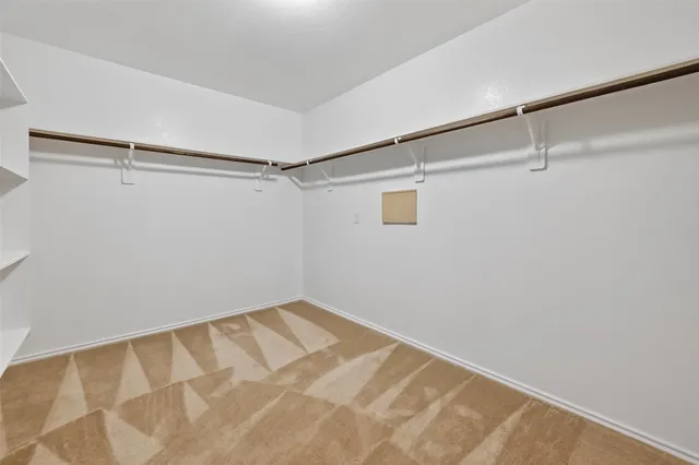 a view of a room with racks on the wall