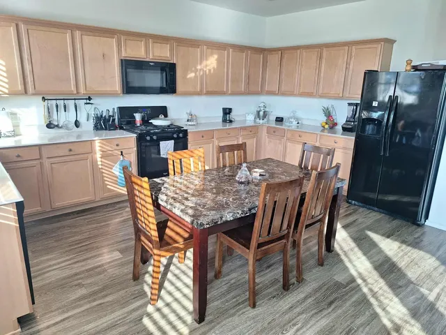 a bedroom with bed and a closet