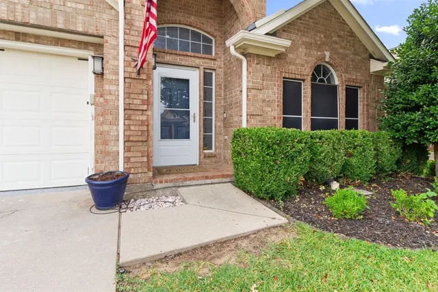a front view of a house with yard