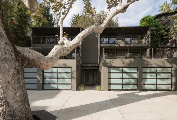 a front view of a house with a garage