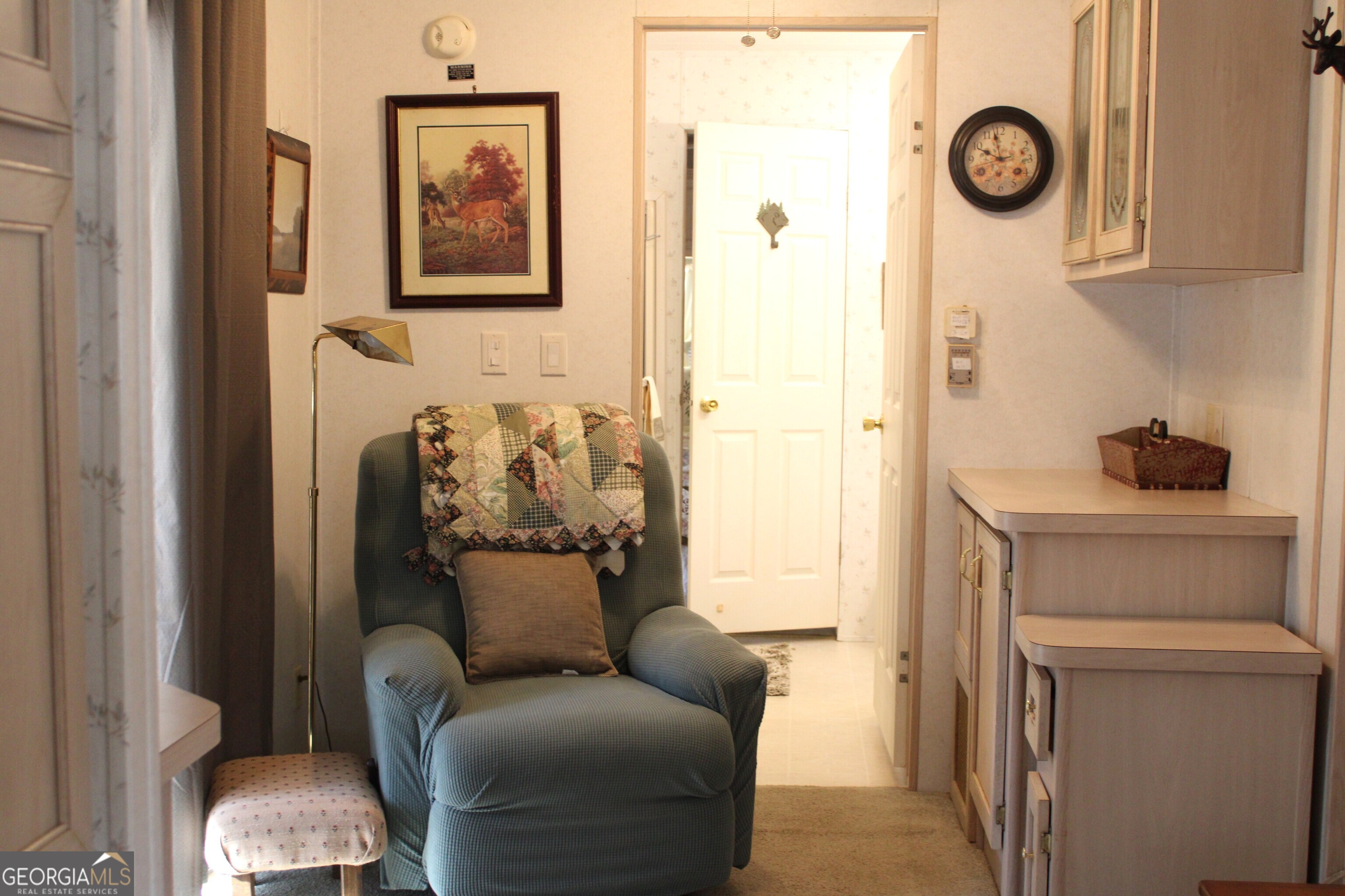 79 Maple Wood Lane Cleveland, GA 30528 - Photo 12 of 18 a living room with furniture and a window