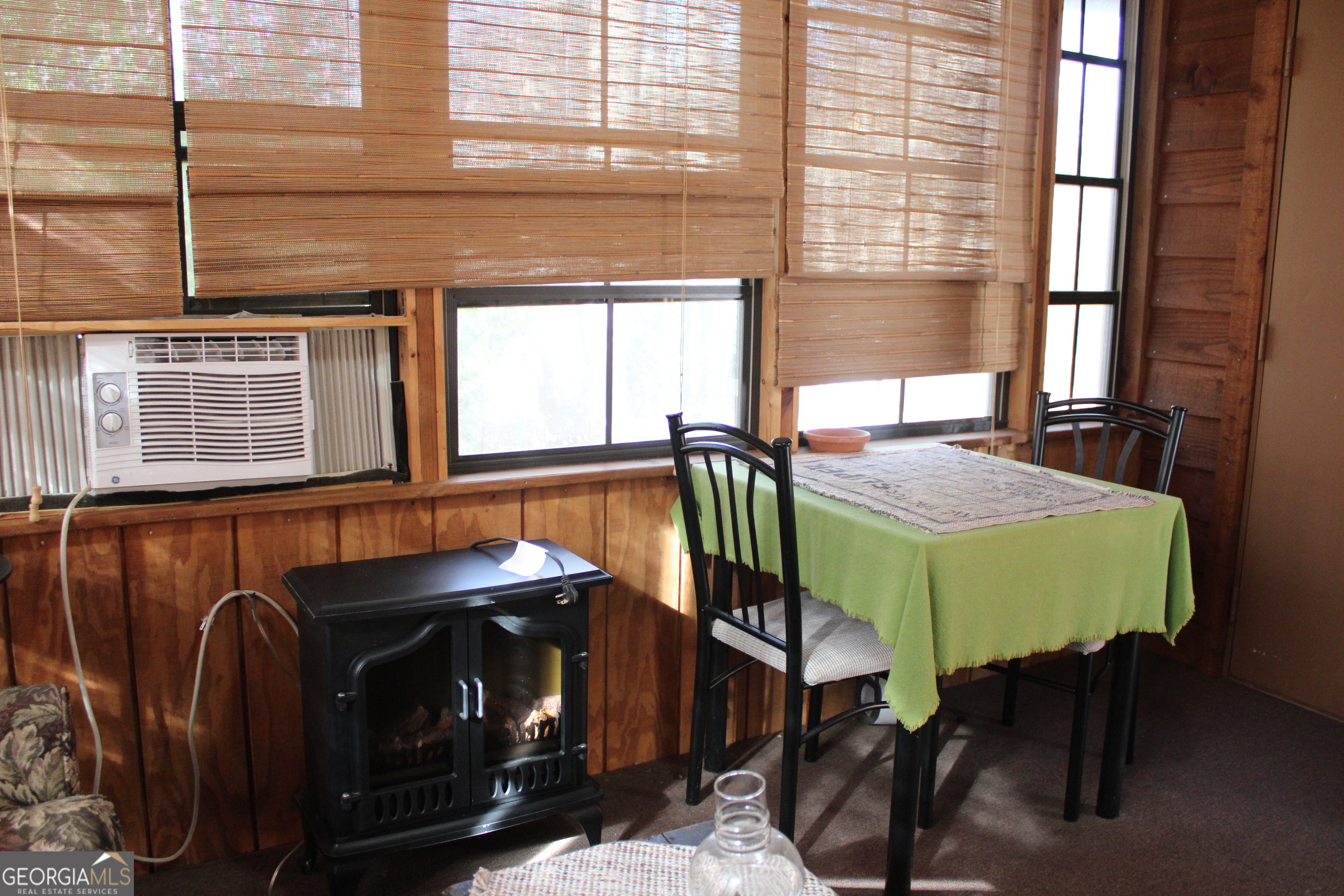 79 Maple Wood Lane Cleveland, GA 30528 - Photo 14 of 18 a dining room with furniture and window
