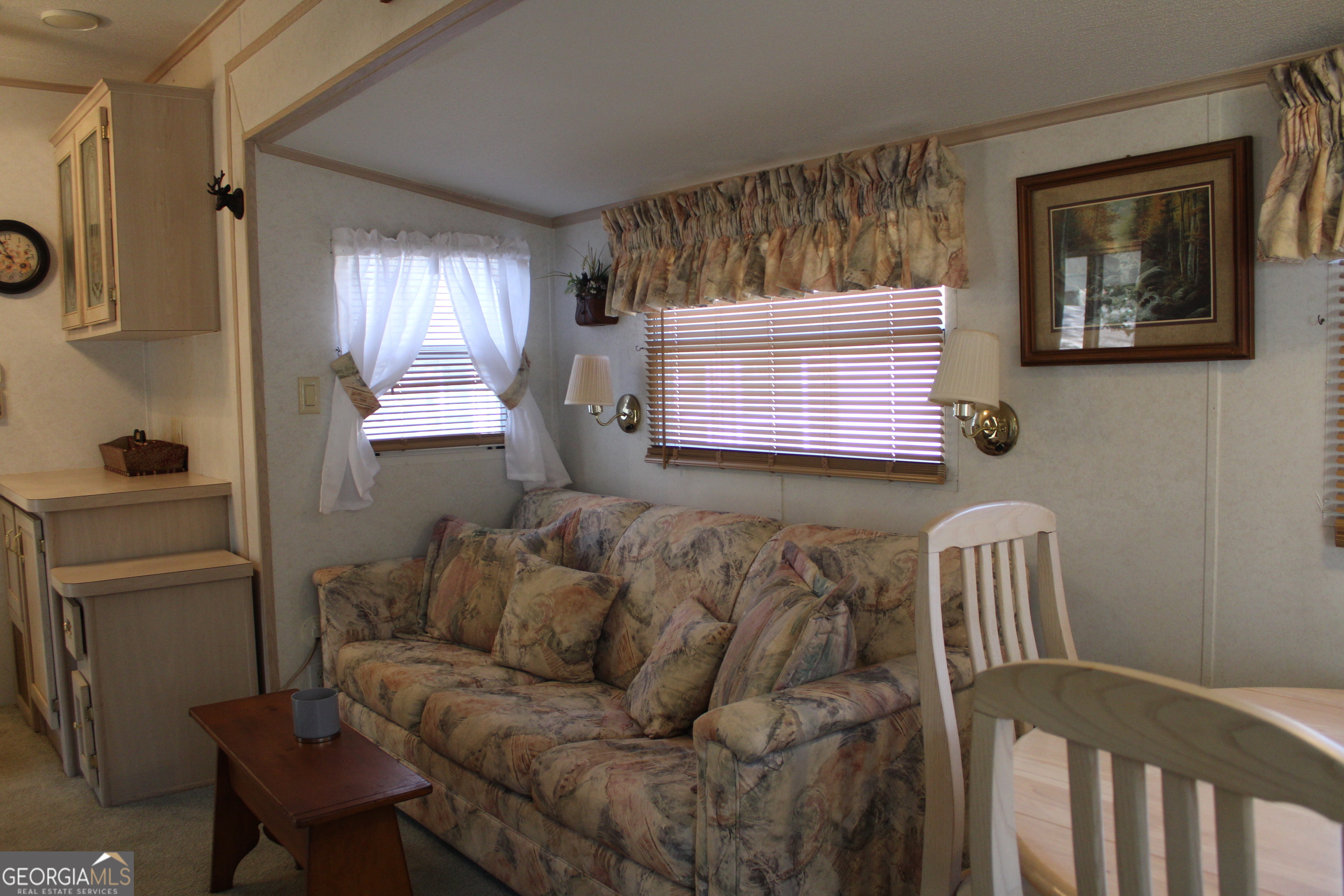 79 Maple Wood Lane Cleveland, GA 30528 - Photo 5 of 18 a living room with furniture and a window
