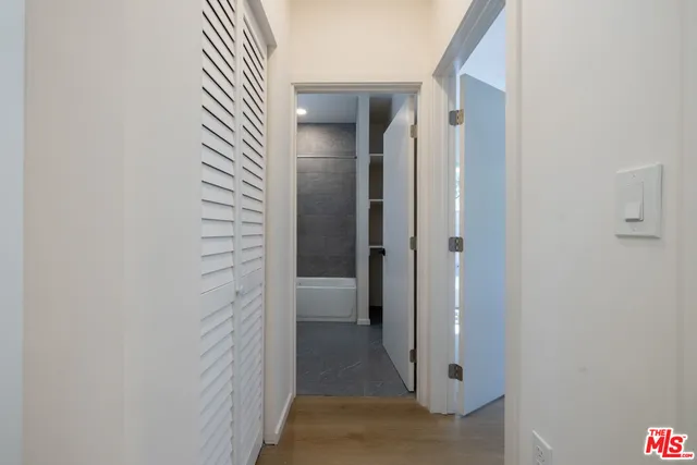 a close view of a utility room with dryer and washer