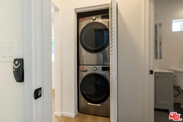 a view of a house with a tree