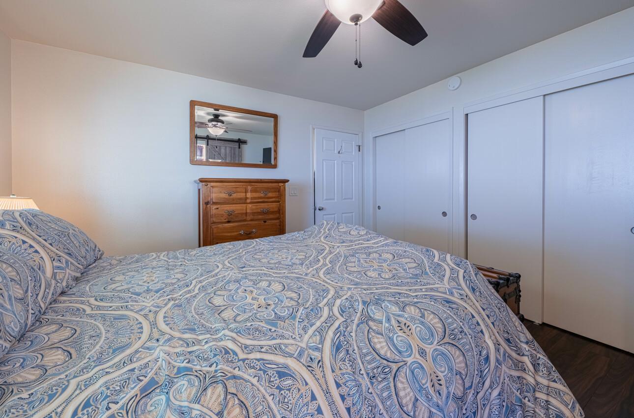 18101 Berta Canyon Road Salinas, CA 93907 - Photo 16 of 32 a bedroom with a bed and a dresser