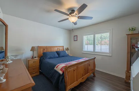 a bed room with a bed and a window