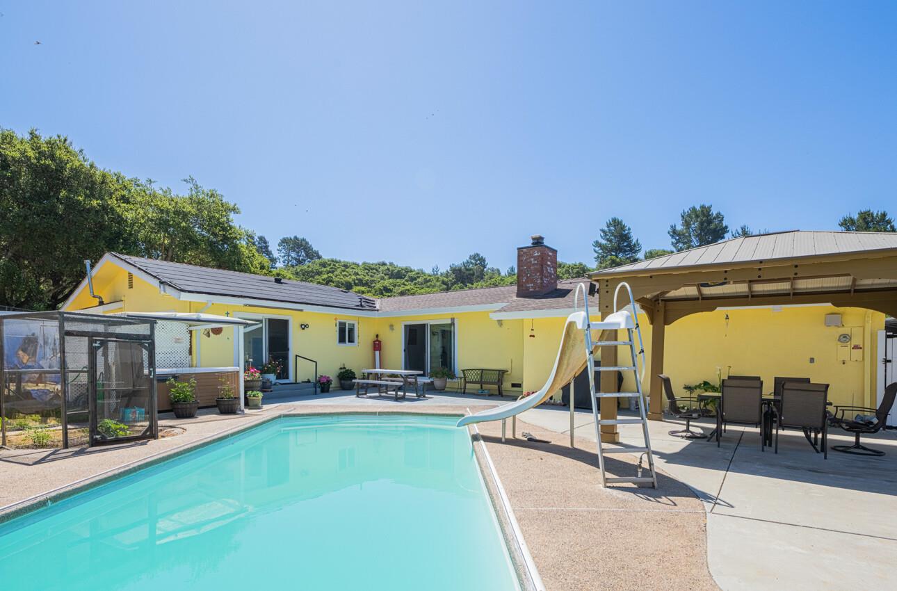 18101 Berta Canyon Road Salinas, CA 93907 - Photo 26 of 32 a view of a house with swimming pool and sitting area