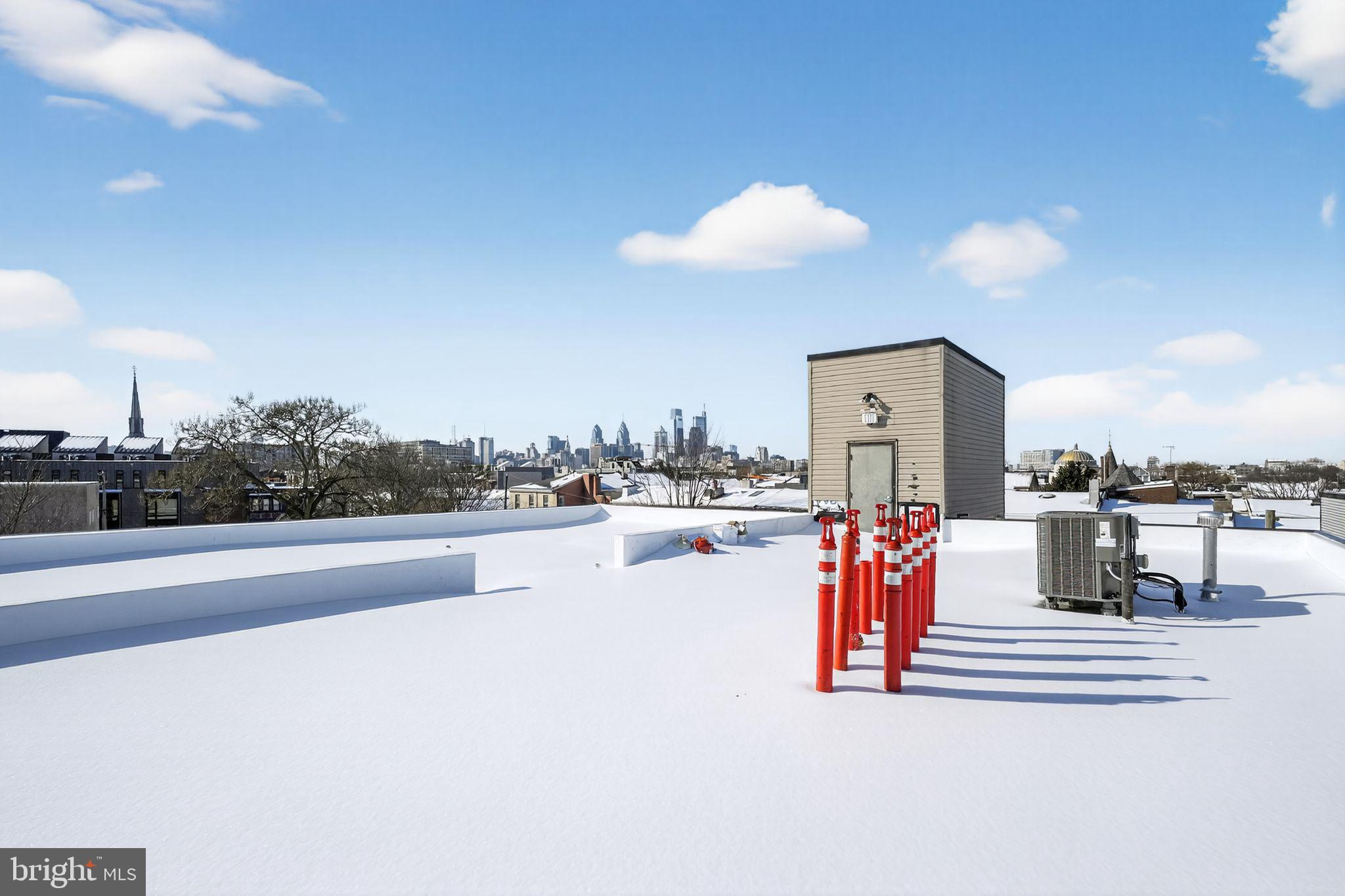 926 North 3rd Street, Unit 4D Philadelphia, PA 19123 - Photo 13 of 15 a view of living room with furniture and city view