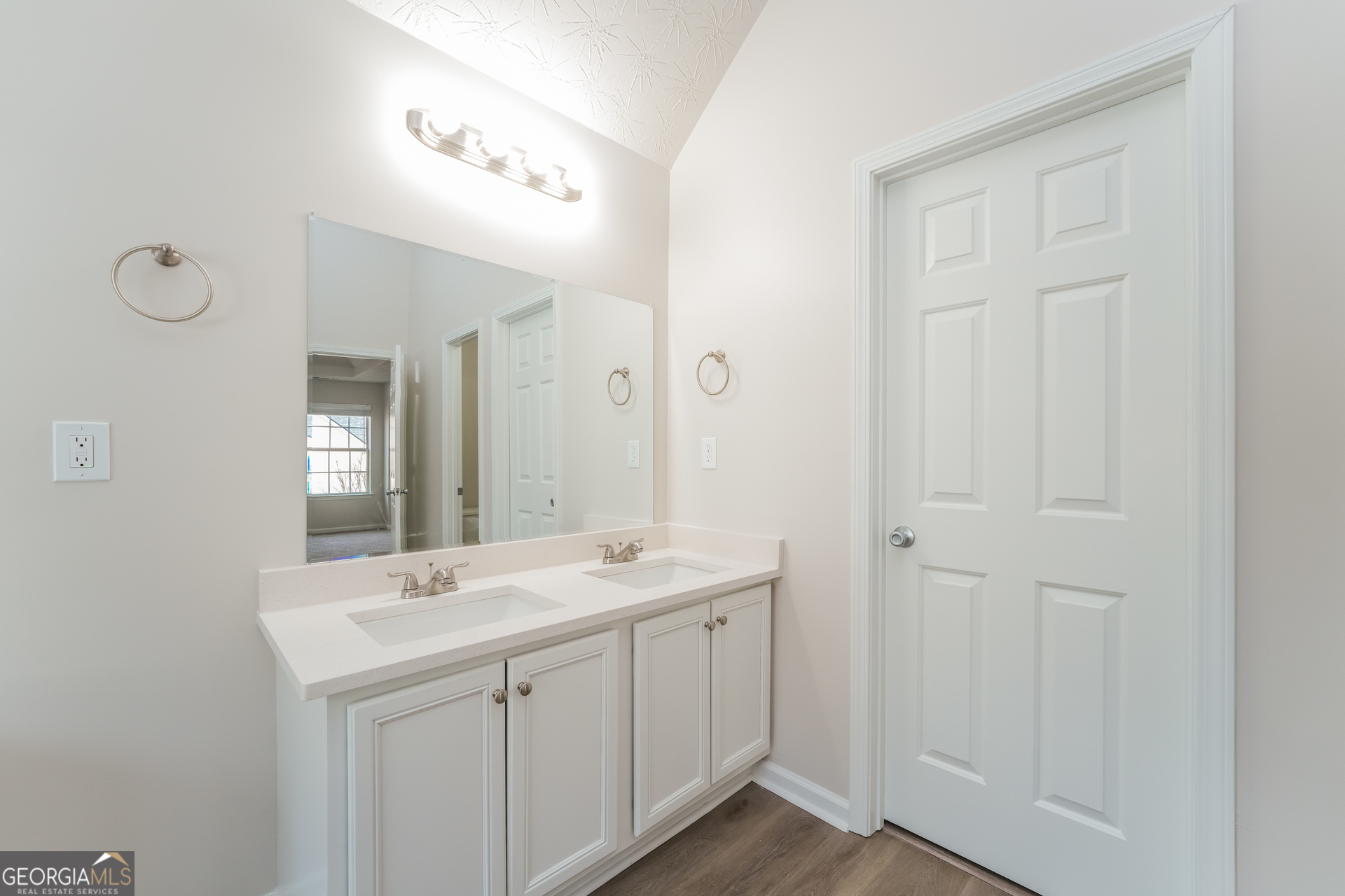 15 Emerson Trail Covington, GA 30016 - Photo 10 of 17 a bathroom with 2 sink tub and a mirror