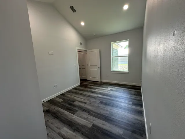 a view of an empty room and window