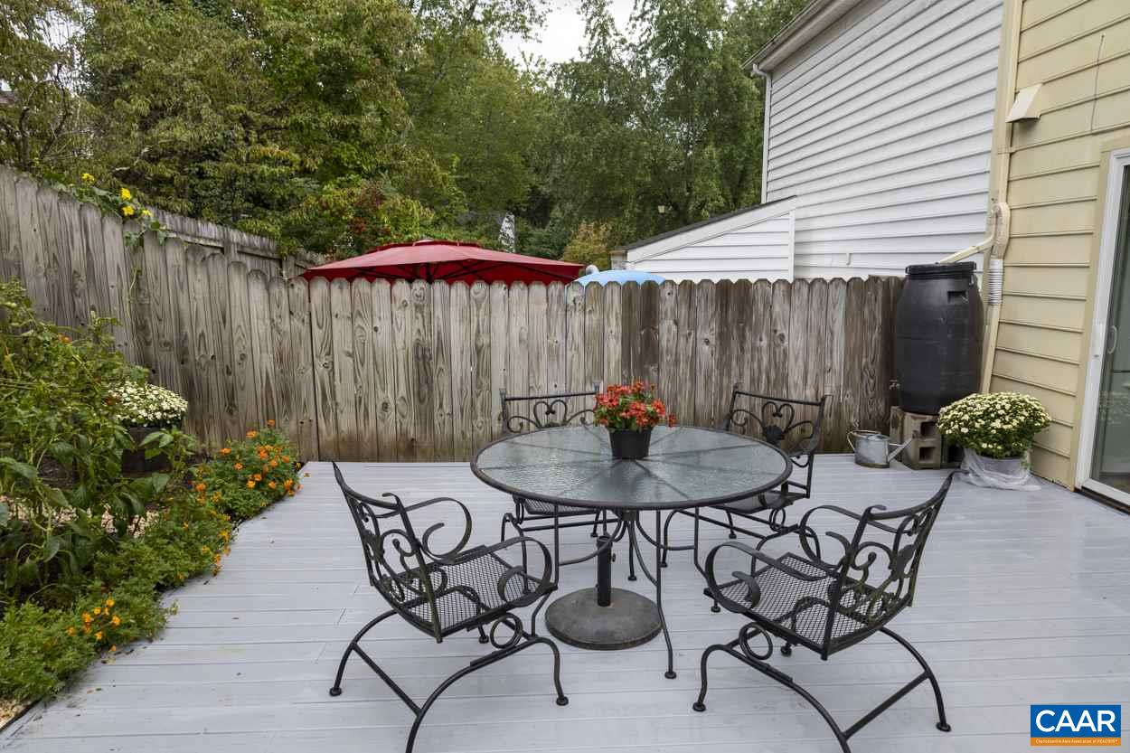 1648 Cool Spring Road Charlottesville, VA 22901 - Photo 41 of 50 a view of a table and chairs in backyard