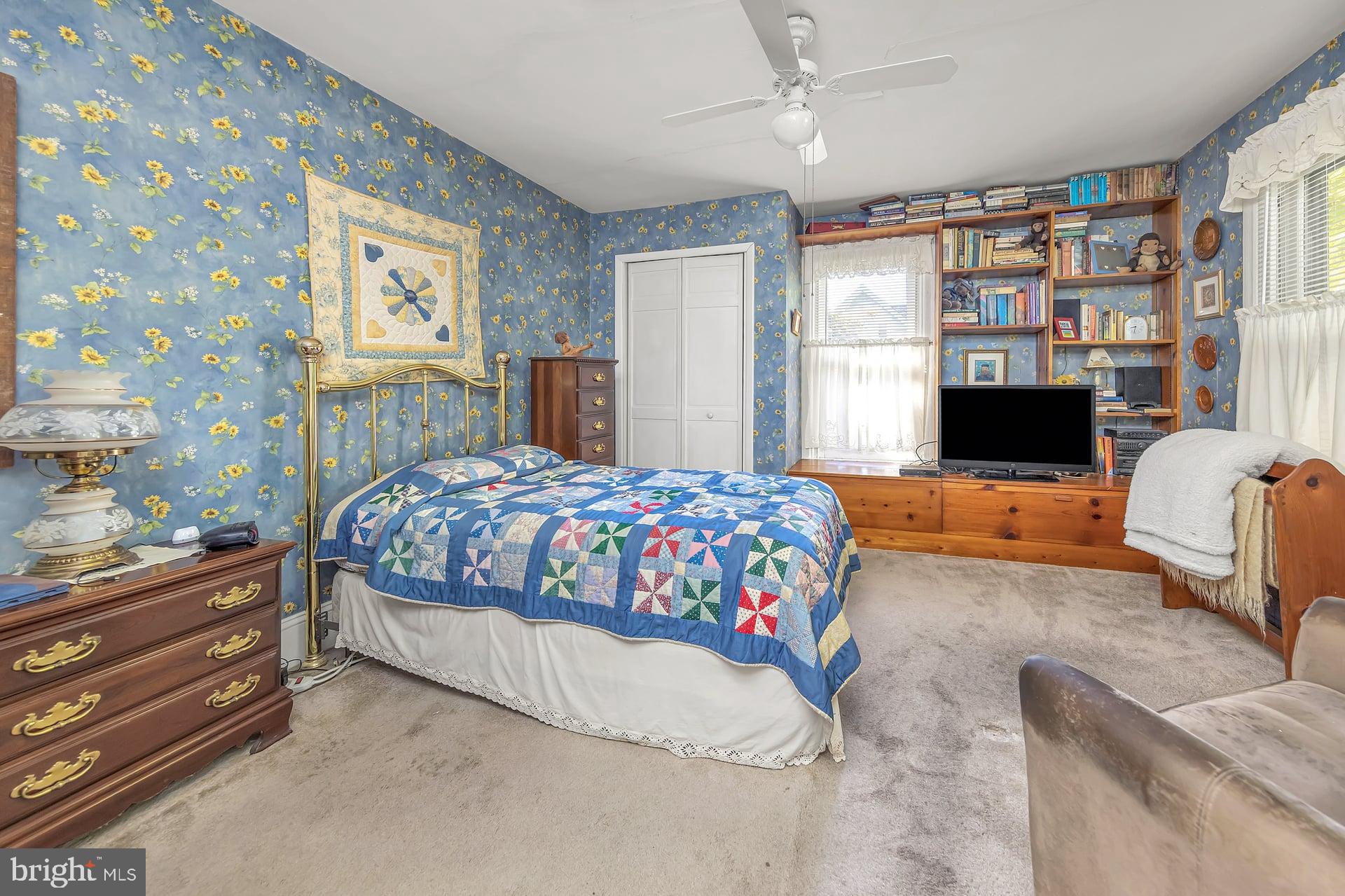 75 North Main Street Mullica Hill, NJ 08062 - Photo 22 of 35 a bedroom with a bed couch and window