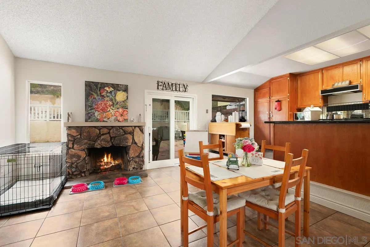 10551 Cadwell Road Santee, CA 92071 - Photo 12 of 32 a living room with furniture and a fireplace