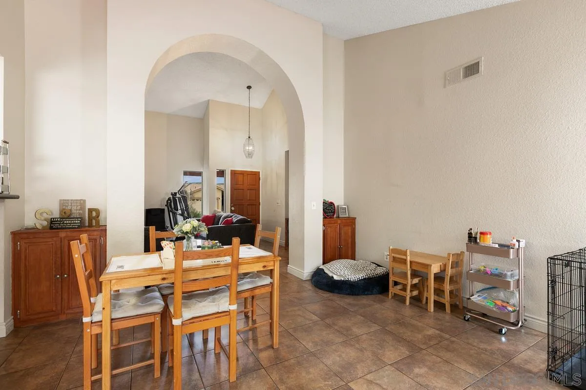 10551 Cadwell Road Santee, CA 92071 - Photo 13 of 32 a view of a dining room with furniture