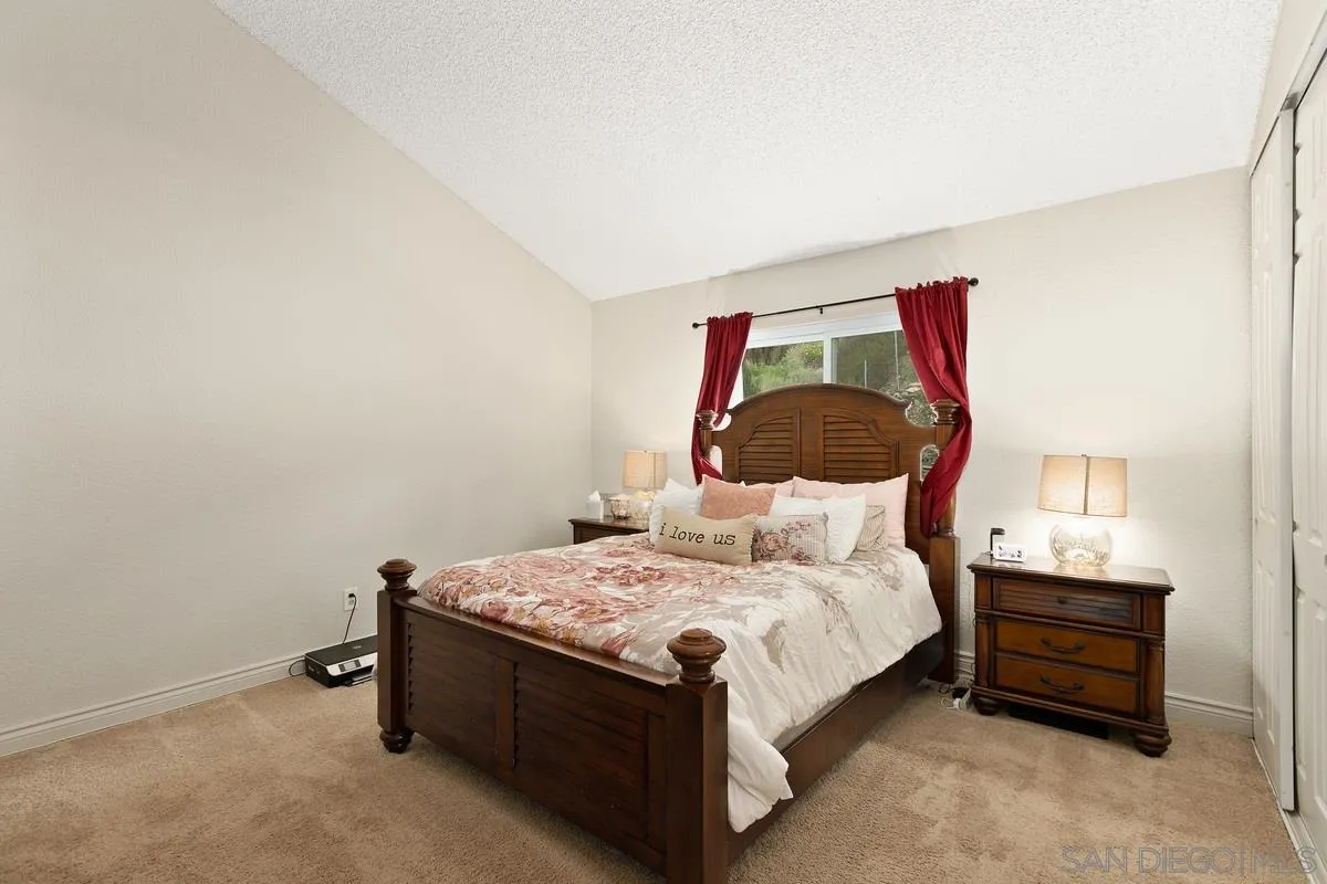 10551 Cadwell Road Santee, CA 92071 - Photo 18 of 32 a bedroom with a bed and a dresser