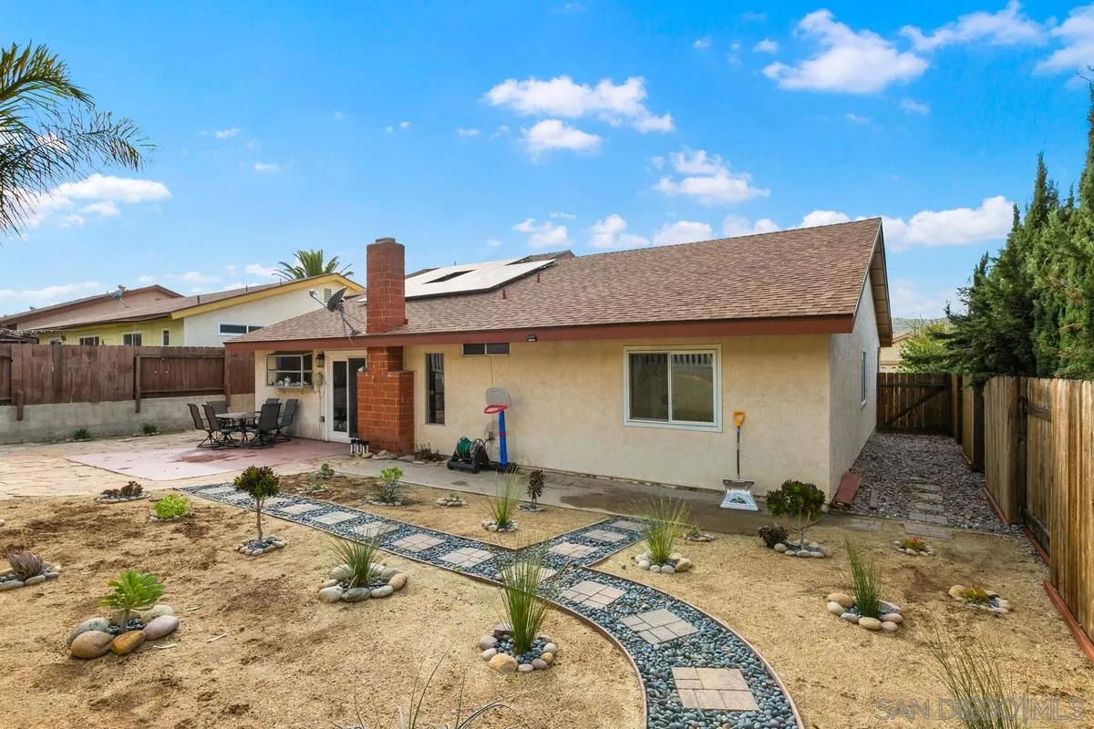 10551 Cadwell Road Santee, CA 92071 - Photo 28 of 32 a front view of a house with a yard covered with snow