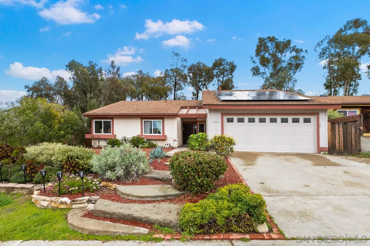 10551 Cadwell Road Santee, CA 92071 - Photo 4 of 32 front view of a house with a yard