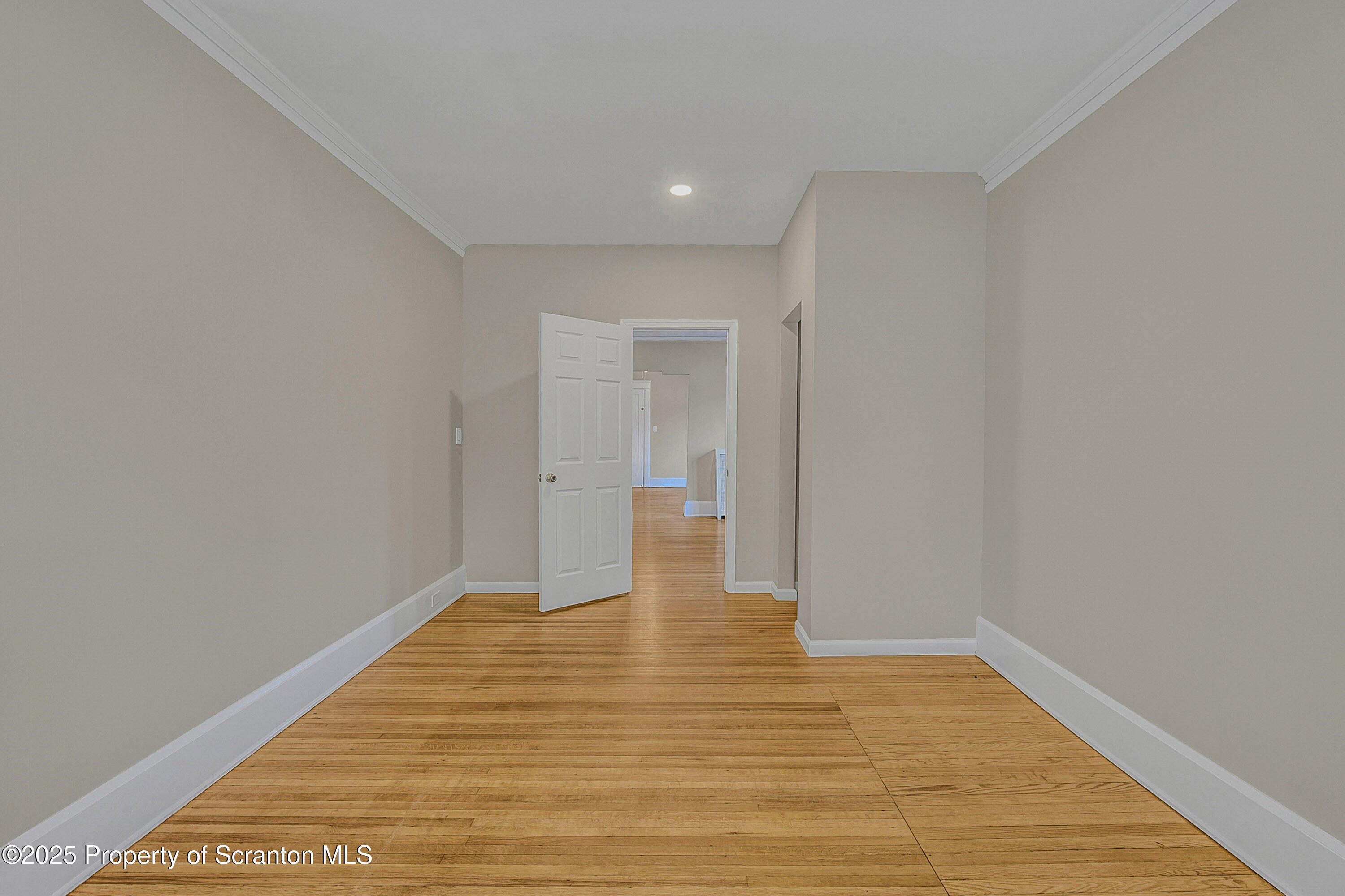 1900 North Washington Avenue, Unit 1 Scranton, PA 18509 - Photo 12 of 26 a view of an empty room with wooden floor