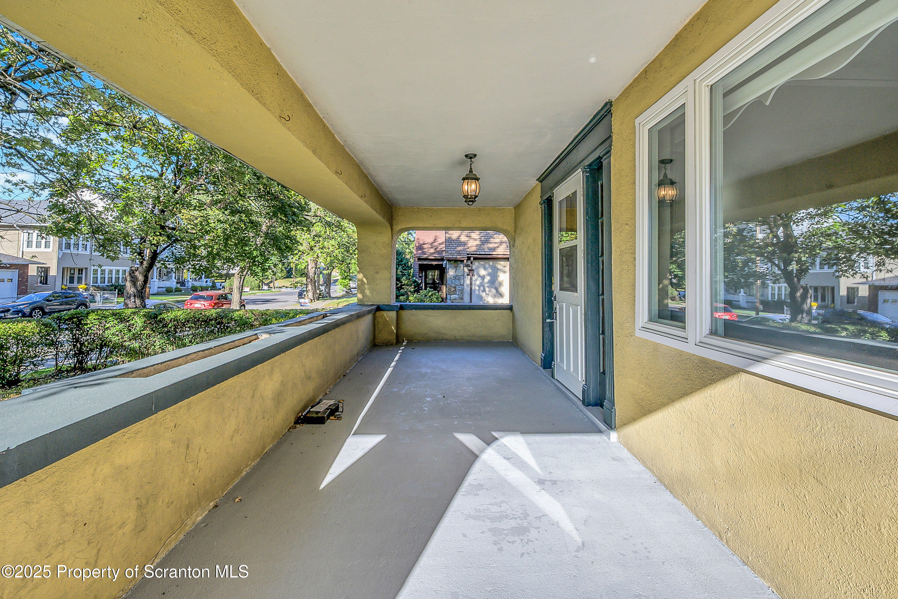1900 North Washington Avenue, Unit 1 Scranton, PA 18509 - Photo 4 of 26 a view of swimming pool with a porch