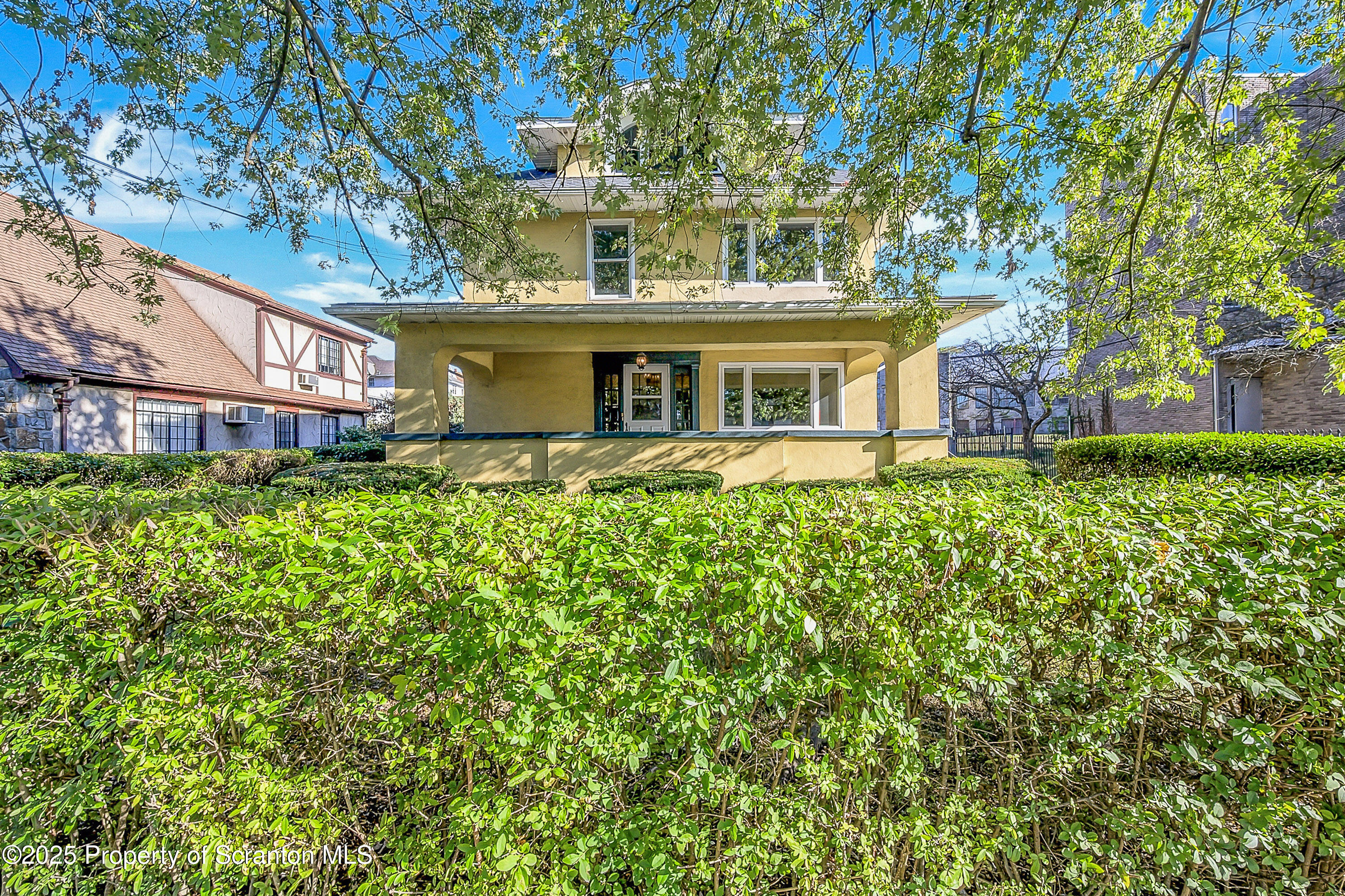 1900 North Washington Avenue, Unit 1 Scranton, PA 18509 - Photo 6 of 26 front view of a house with a yard