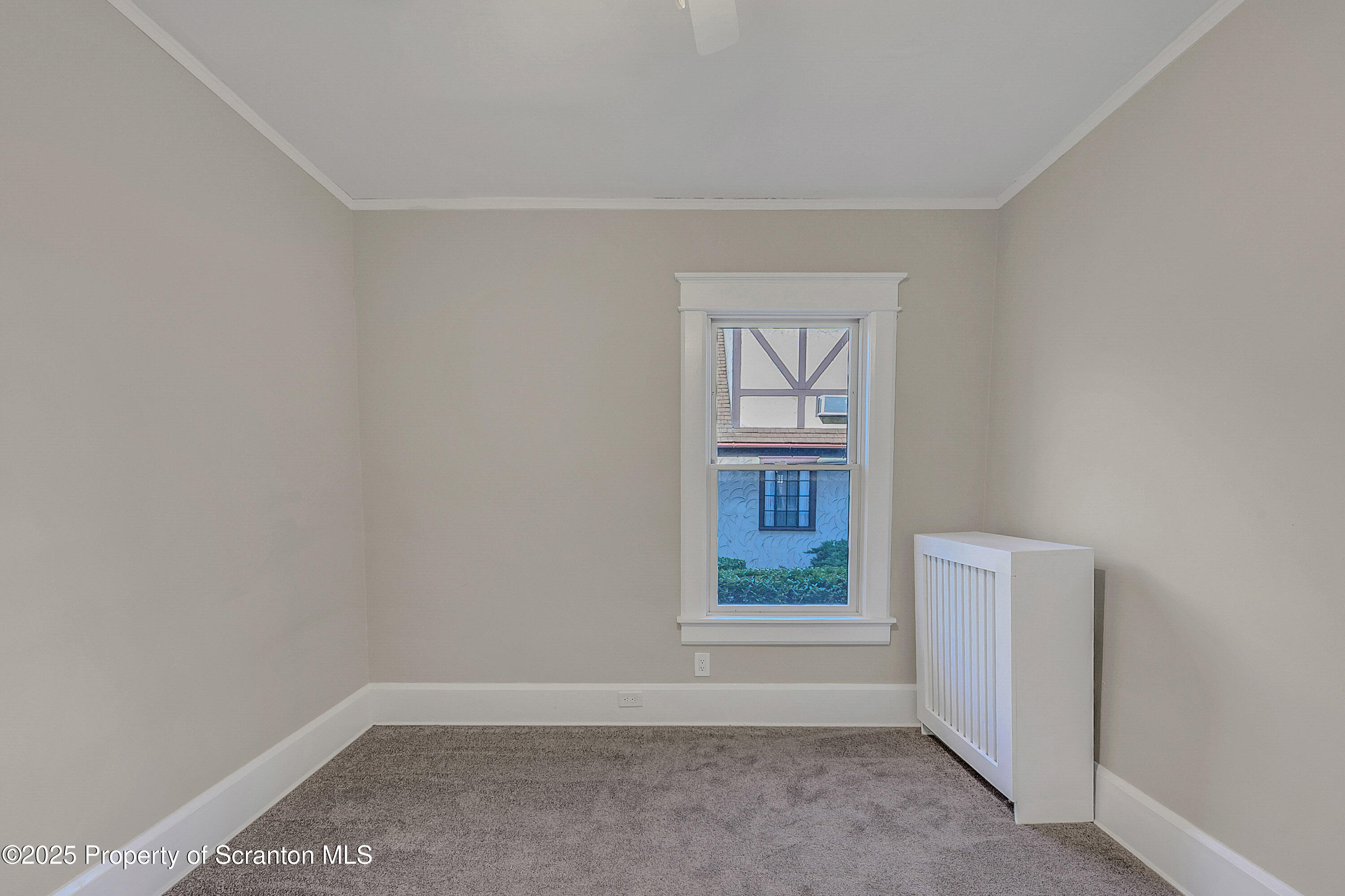 1900 North Washington Avenue, Unit 1 Scranton, PA 18509 - Photo 9 of 26 an empty room with windows and closet