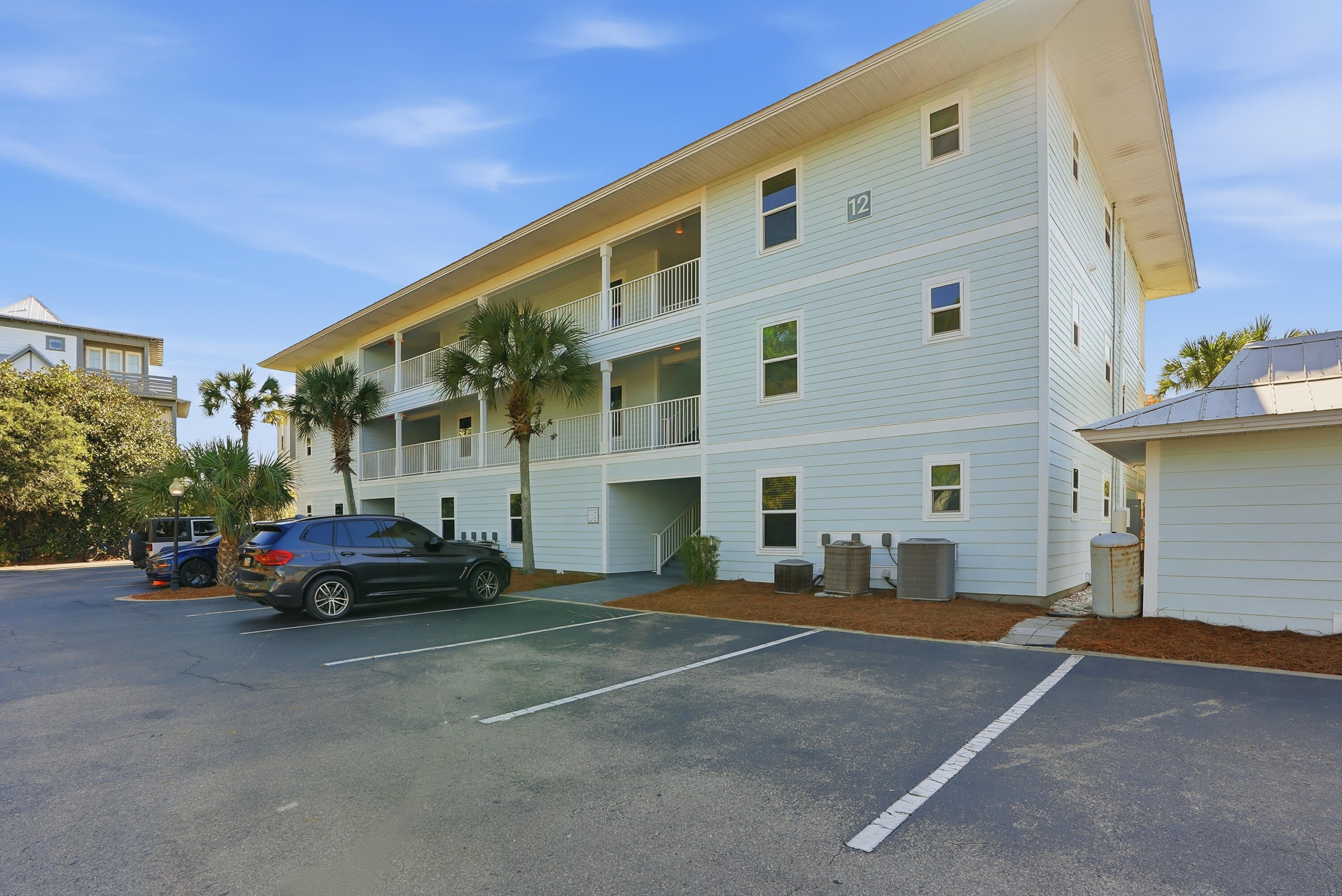 11 Beachside Drive, Unit 1214 Santa Rosa Beach, FL 32459 - Photo 11 of 28 a car parked in front of a building
